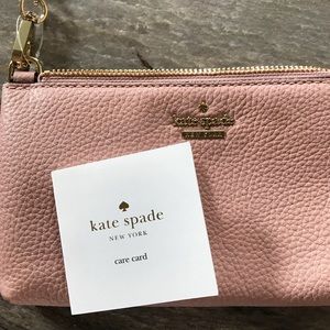 Kate Spade small cross body purse. New w/o tags.